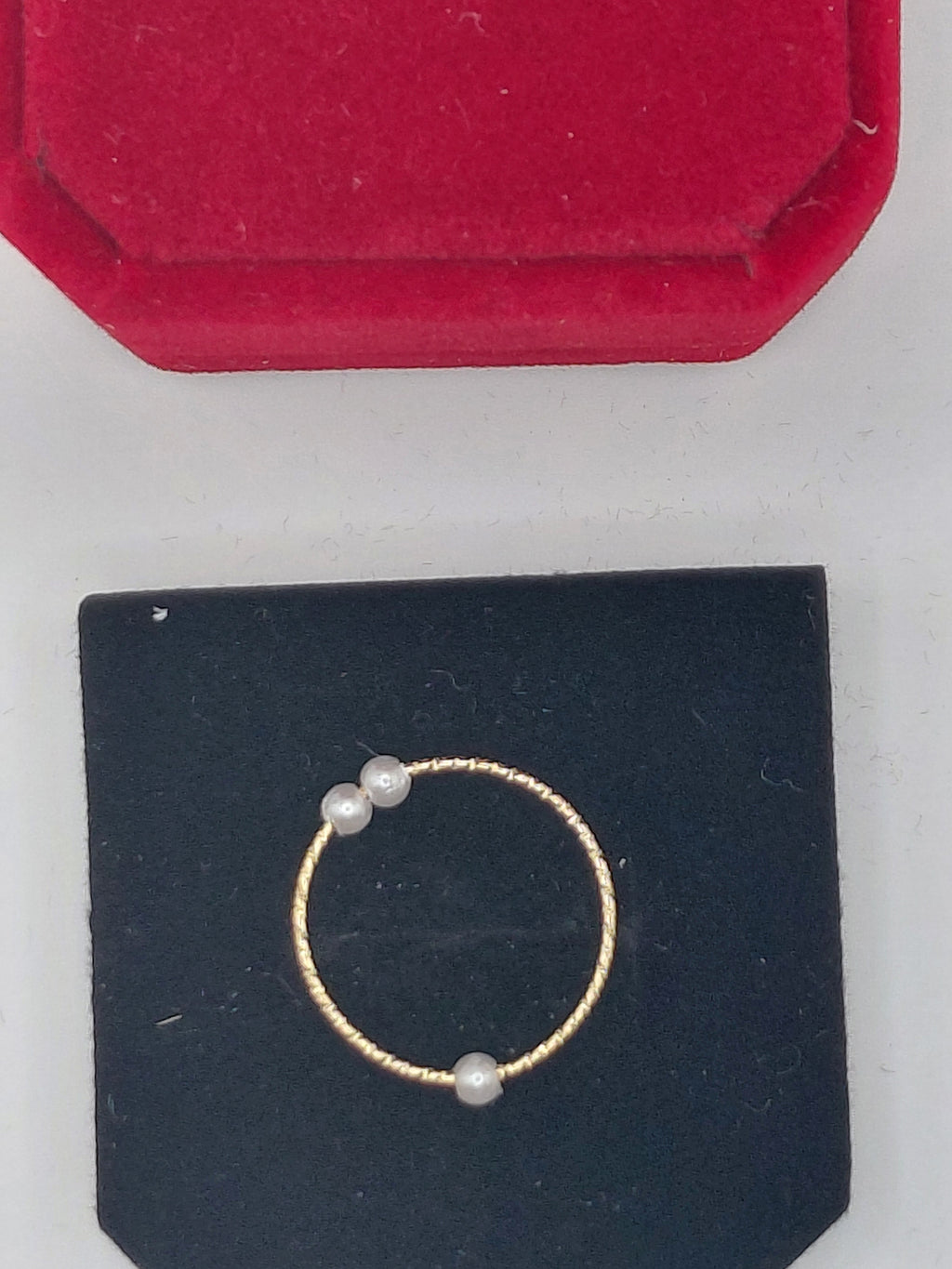 Bague perles tournantes