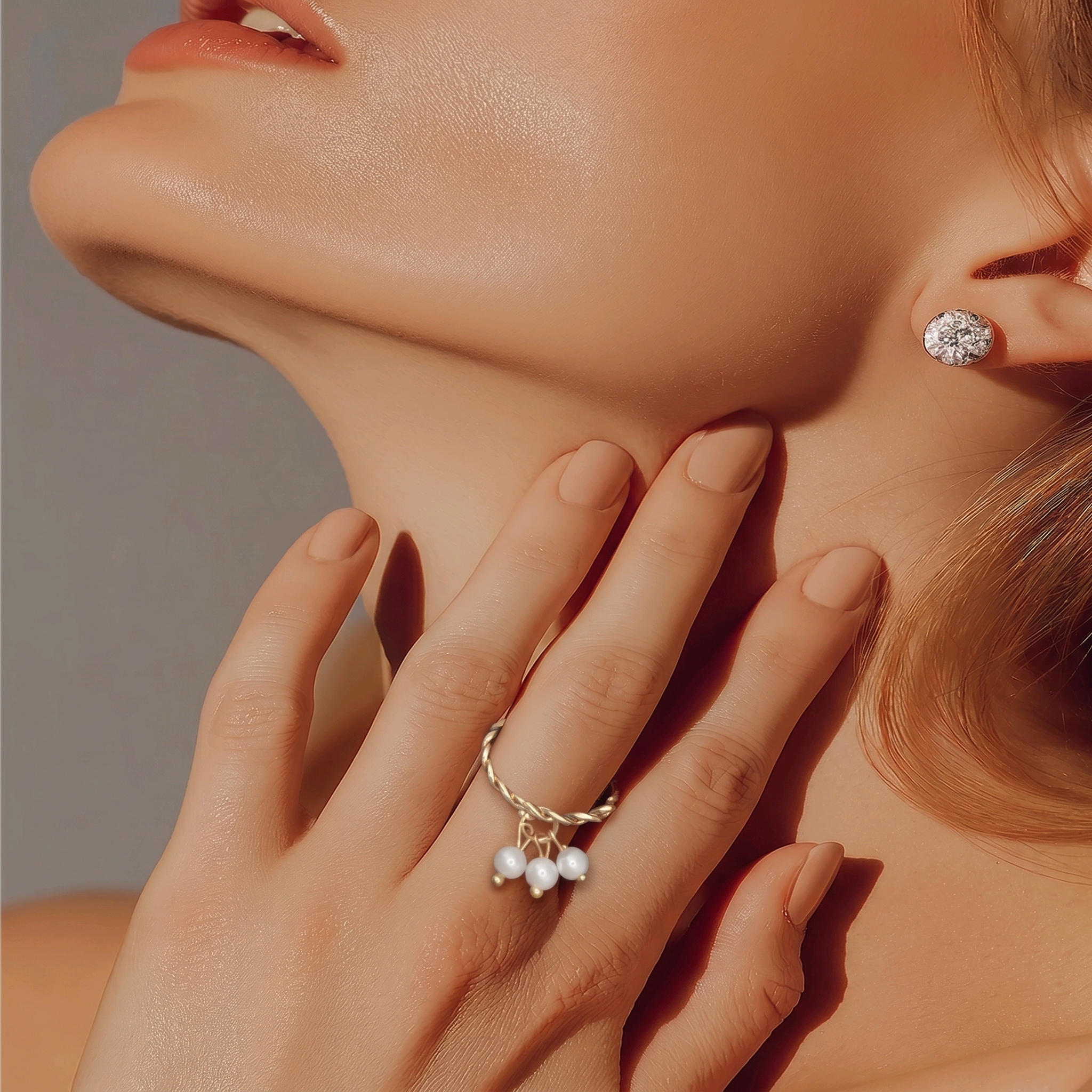 Bague avec perles pendantes