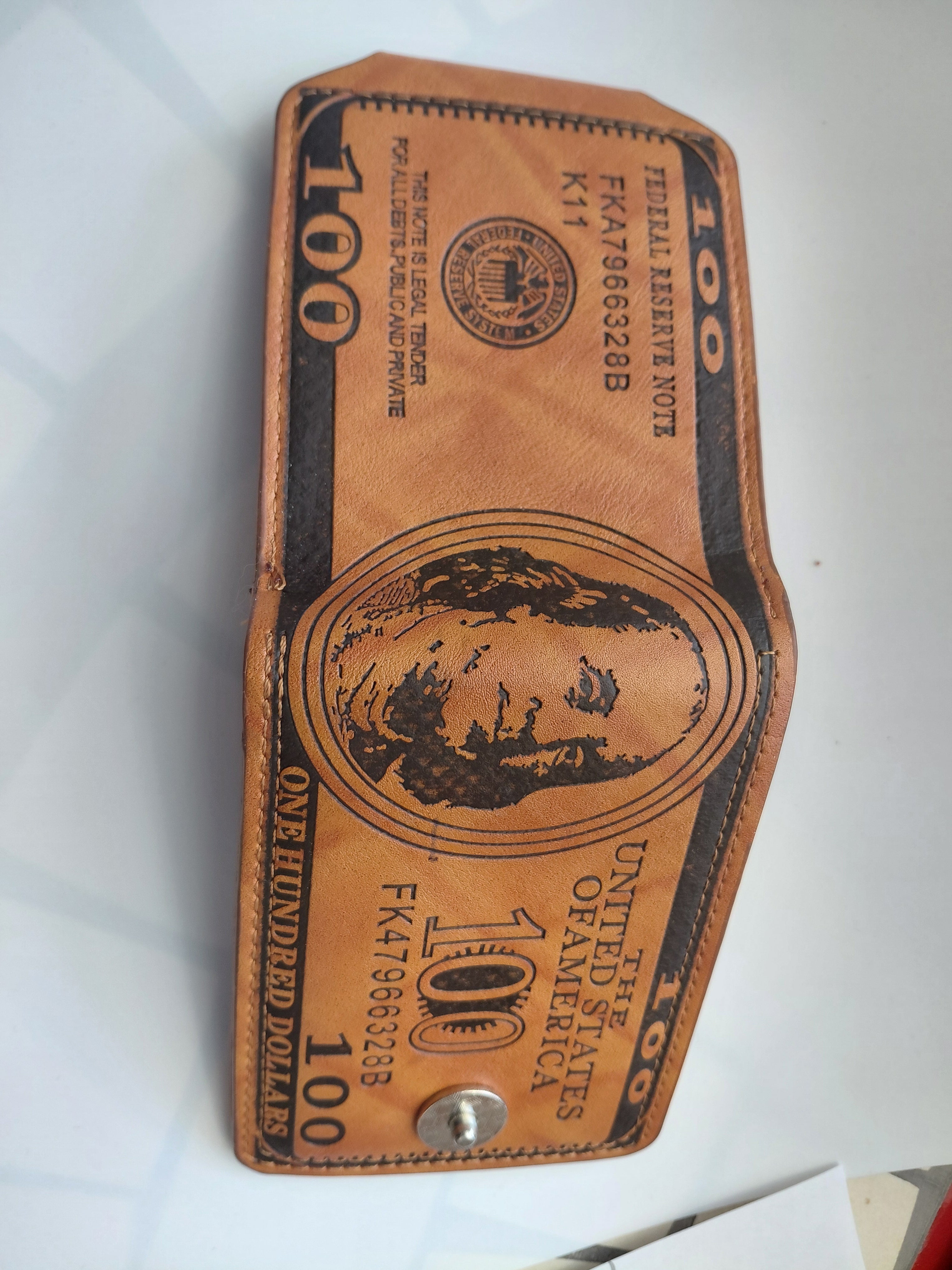 Portefeuille motif dollar
